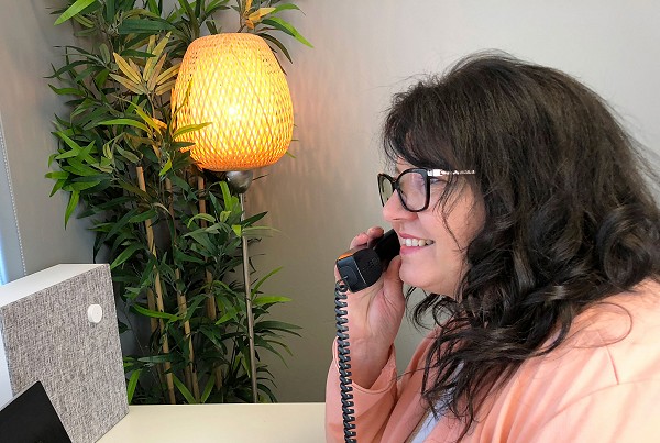 A Huberty employee answers the phone.
